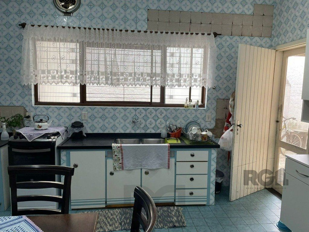 Casa 4 Dormitórios Bairro Teresópolis — foto 13