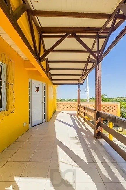casa de 4 dormitórios, no bairro Lomba do Pinheiro — foto 4