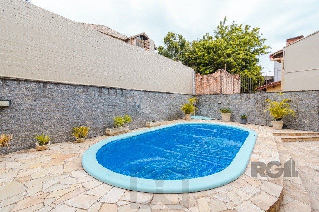 Casa com 4 dormitórios no bairro Morro Santana — foto 10