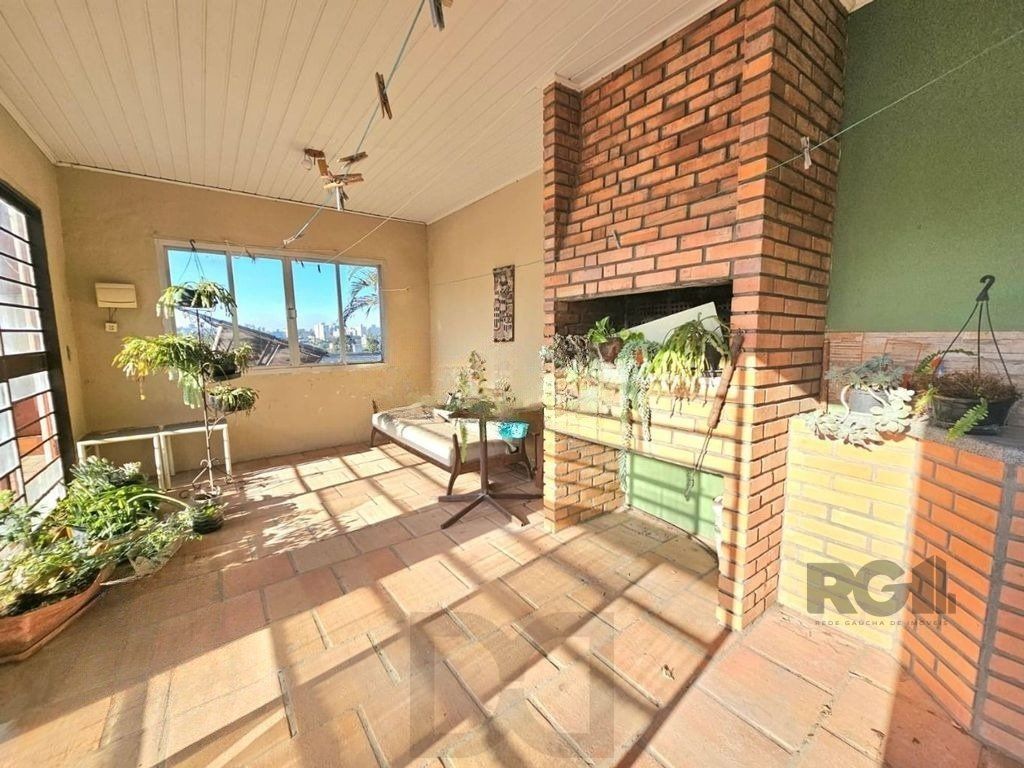 Casa de 4 dormitórios á venda no bairro Partenon — foto 3