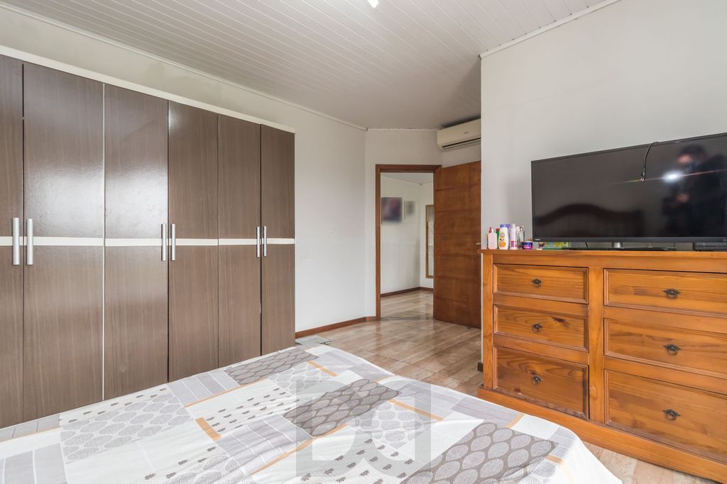 Casa de 6 dormitórios à venda Bairro Vila Nova - Porto Alegre — foto 13