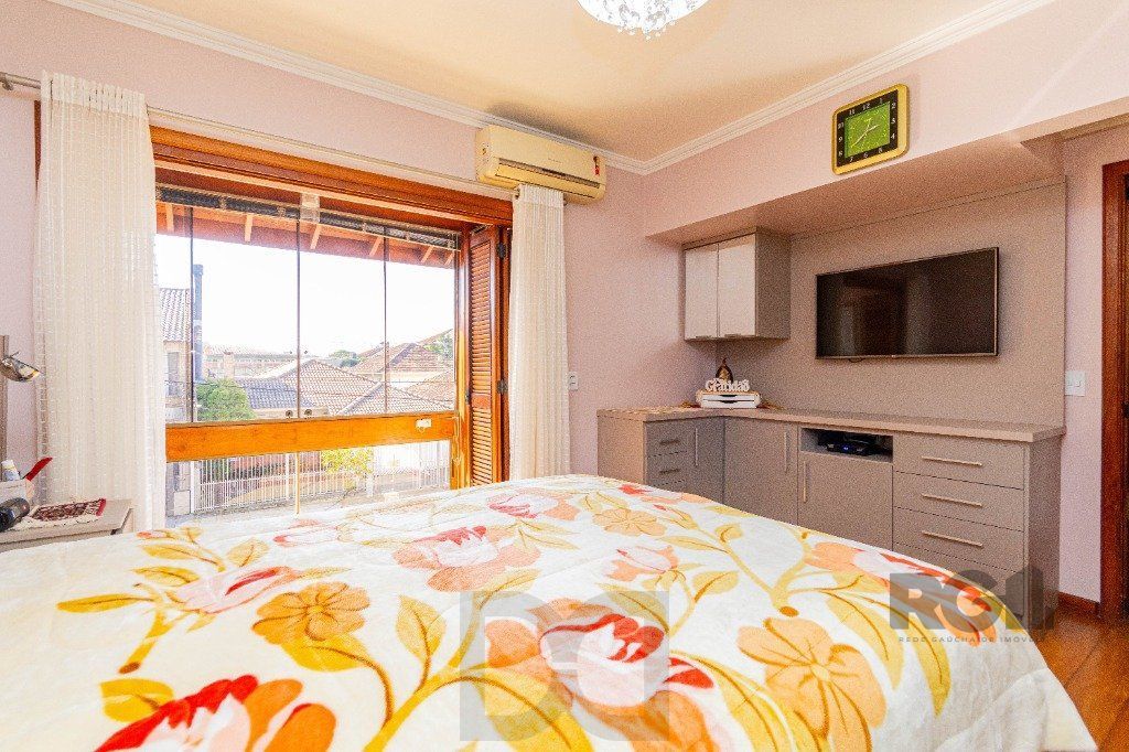 Casa de 4 dormitórios 304m² no bairro Jardim Lindóia — foto 43