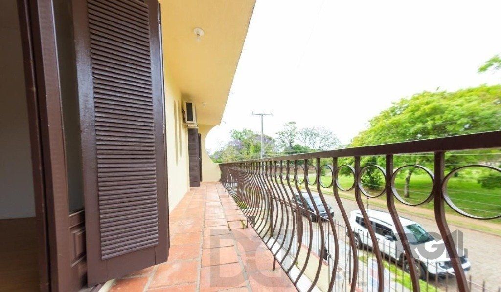 Casa para Venda - 450m², 4 dormitórios, sendo 3 suites, 5 vagas - Nonoai — foto 11