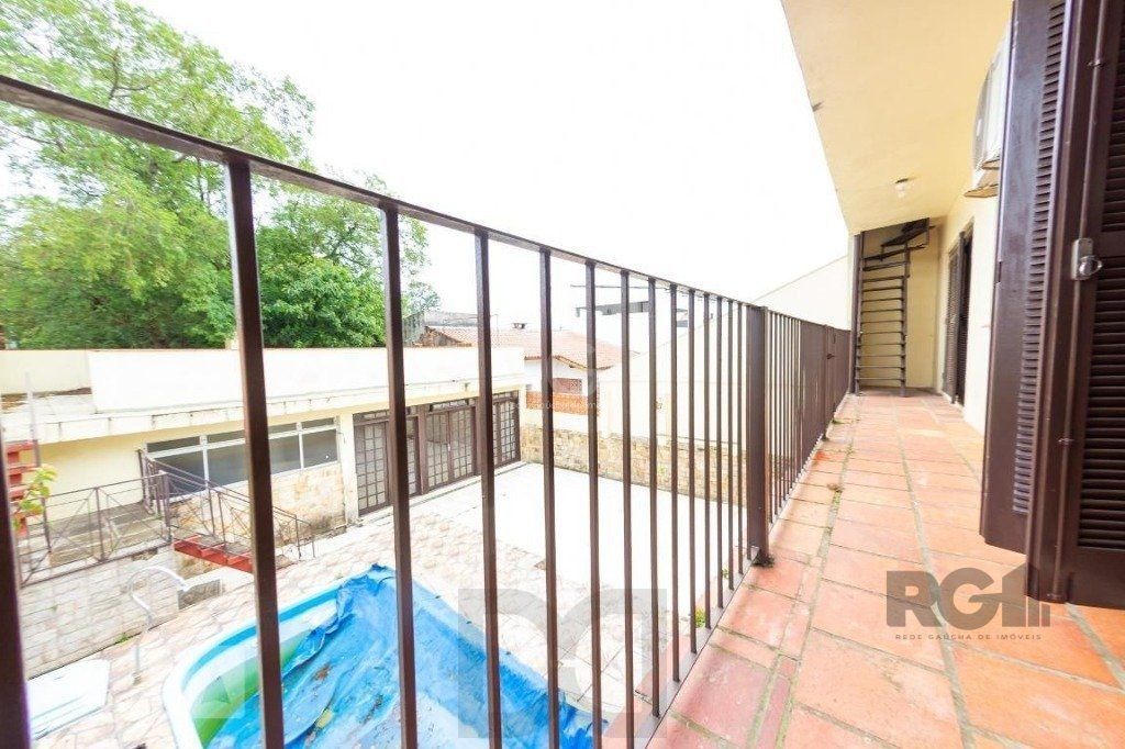 Casa para Venda - 450m², 4 dormitórios, sendo 3 suites, 5 vagas - Nonoai — foto 32