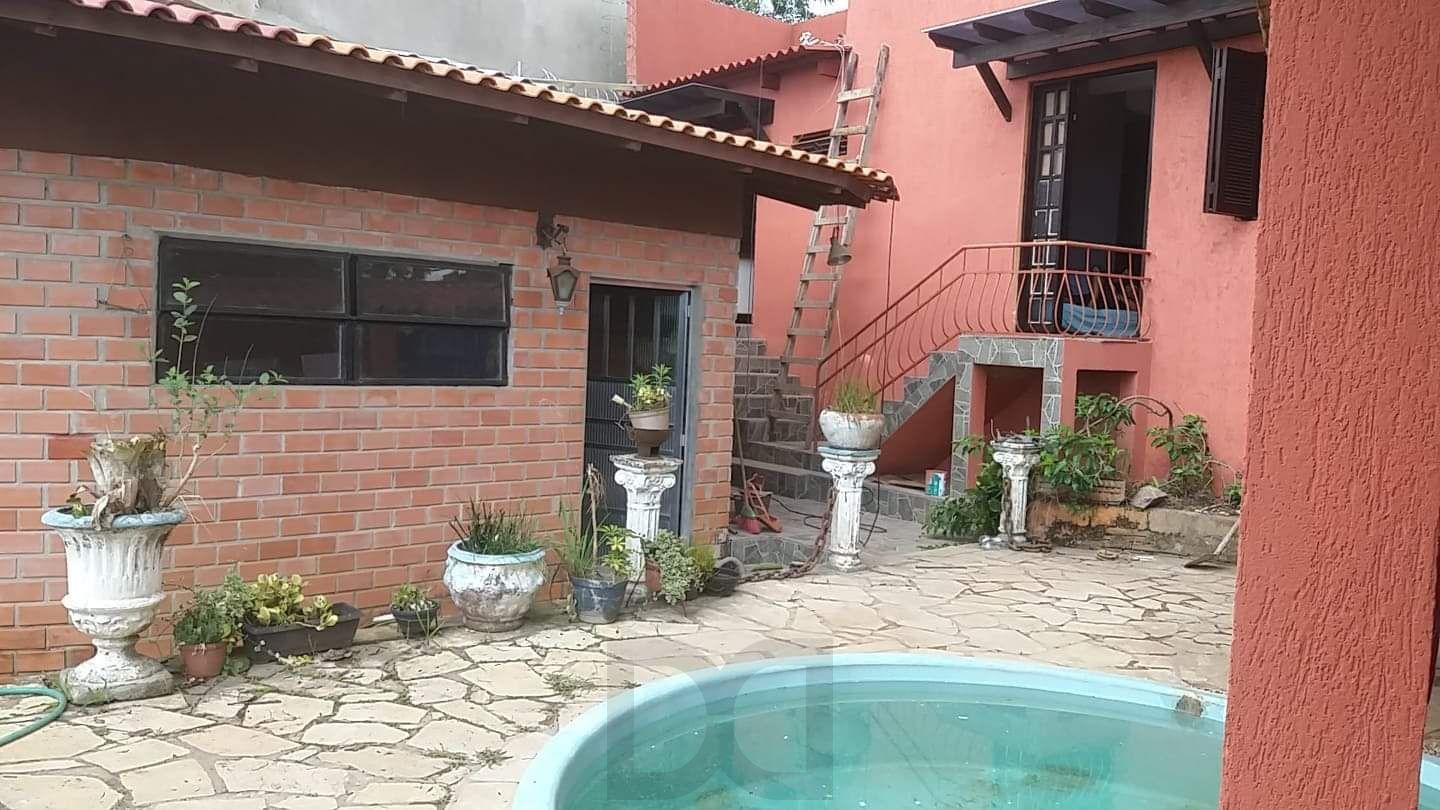 Casa à venda com piscina no bairro Glória, Zona Sul de Porto Alegre – 207m² construídos, pátio amplo e excelente potencial residencial — foto 21