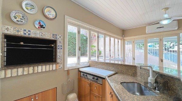 MAGNÍFICA CASA EM LOCALIZAÇÃO PRIVILEGIADA - TRANQUILIDADE E CONFORTO — foto 43