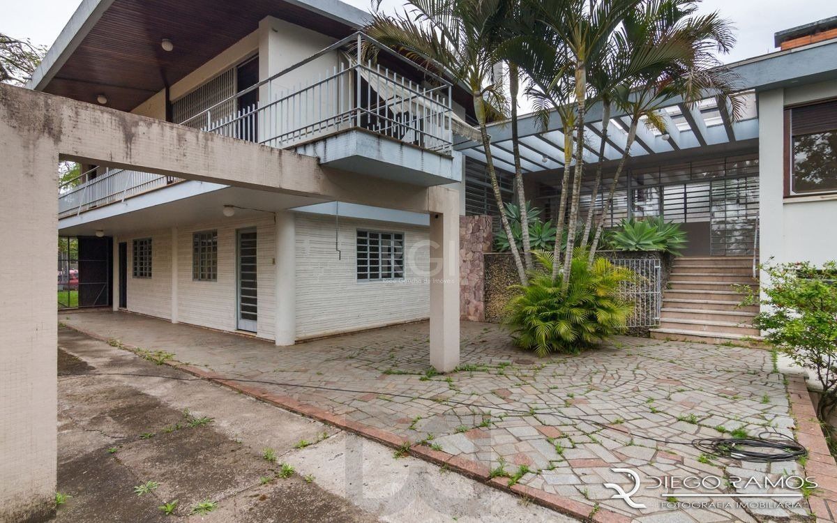 Venda de casa residencial 25,00m x 80,00m- Menino Deus. 4 vagas, 4 dormitórios, sendo 1 suíte, 1 varanda, lareira e churrasqueira. — foto 16
