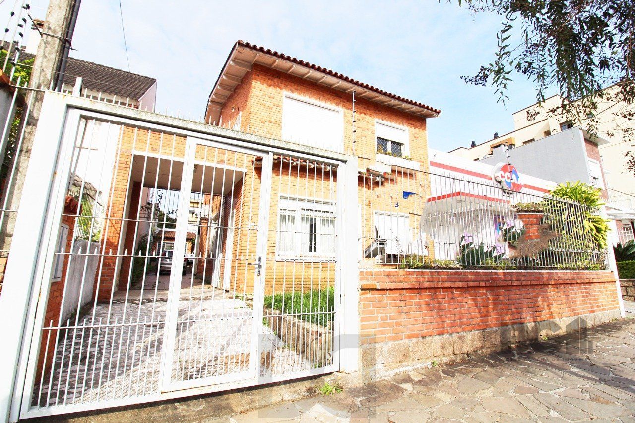 Casa à venda 4 quartos (dormitórios), suíte, 3 vagas - Partenon, Porto Alegre — foto 1