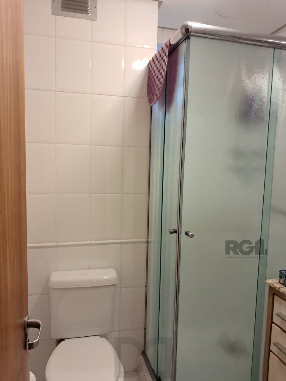 Apartamento de dois quartos, suíte e uma vaga de garagem no bairro Santana em Porto Alegre. — foto 48