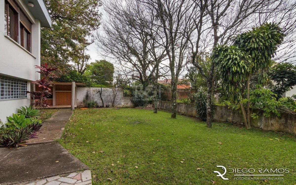 Venda de casa residencial 25,00m x 80,00m- Menino Deus. 4 vagas, 4 dormitórios, sendo 1 suíte, 1 varanda, lareira e churrasqueira. — foto 17