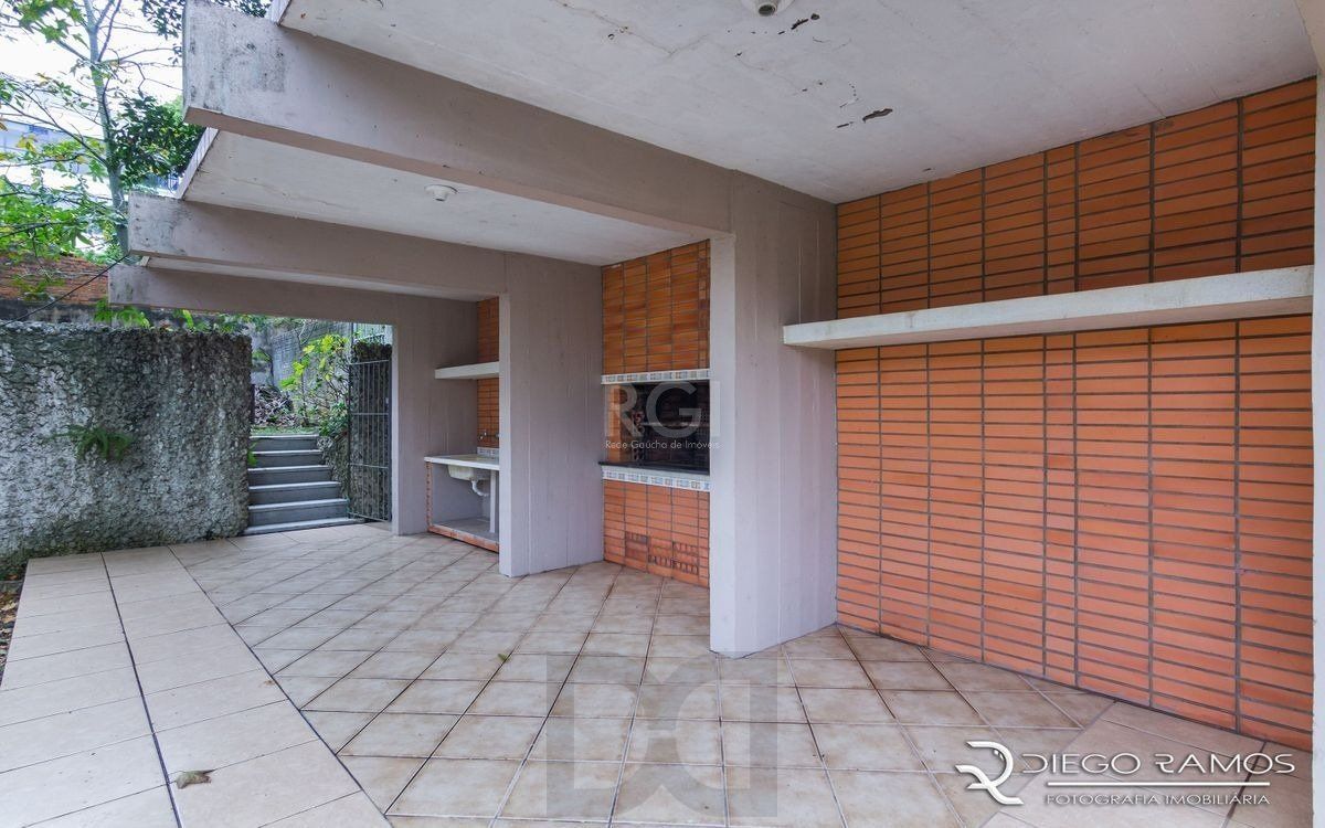 Venda de casa residencial 25,00m x 80,00m- Menino Deus. 4 vagas, 4 dormitórios, sendo 1 suíte, 1 varanda, lareira e churrasqueira. — foto 18