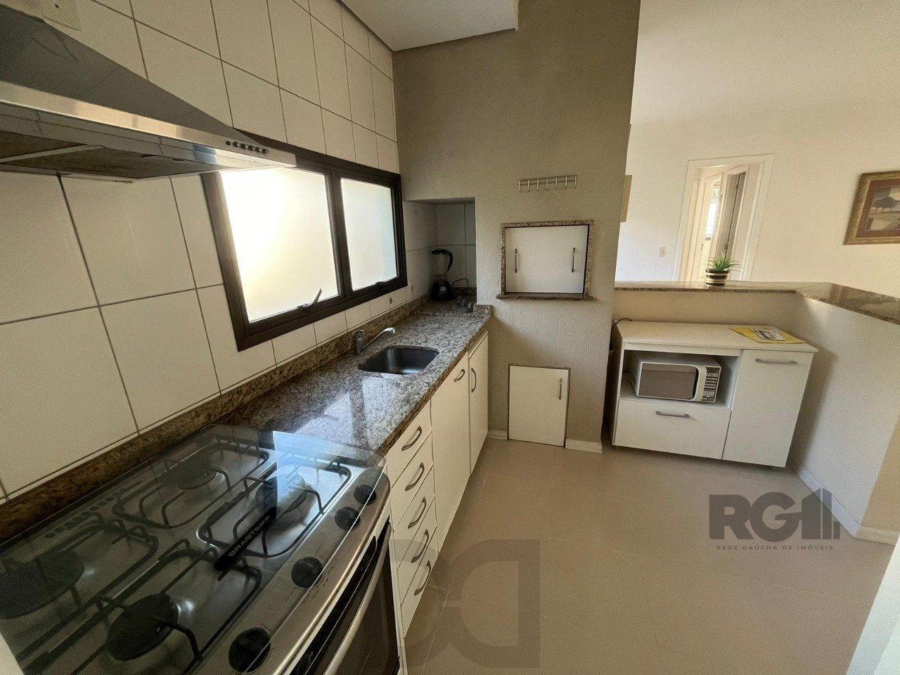 Apartamento de três quartos, suíte, churrasqueira e duas vagas de garagem (box duplo) no bairro Auxiliadora em Porto Alegre. — foto 13