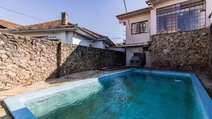 Casa/sobrado 3 dormitórios no bairro Auxiliadora em Porto Alegre — foto 2