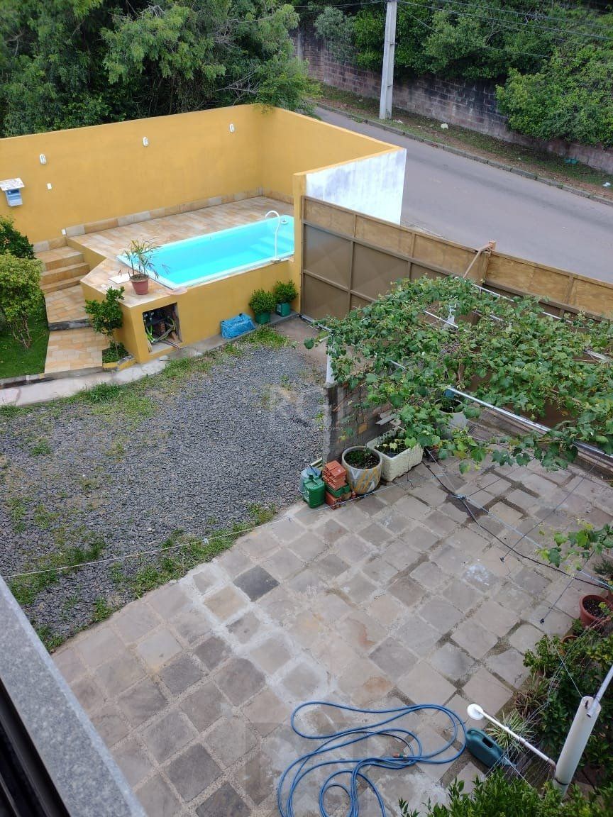 Casa para Venda - 0.18m², 2 dormitórios, sendo 2 suites, 3 vagas - Lomba do Pinheiro — foto 16
