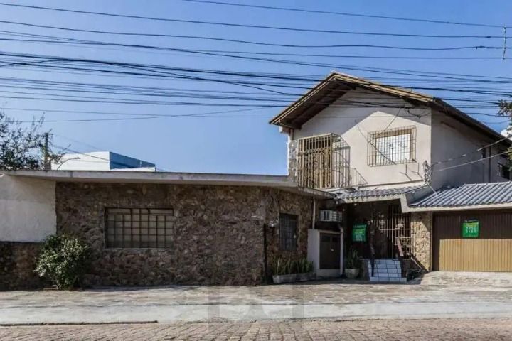 Casa/sobrado 3 dormitórios no bairro Auxiliadora em Porto Alegre — foto 1