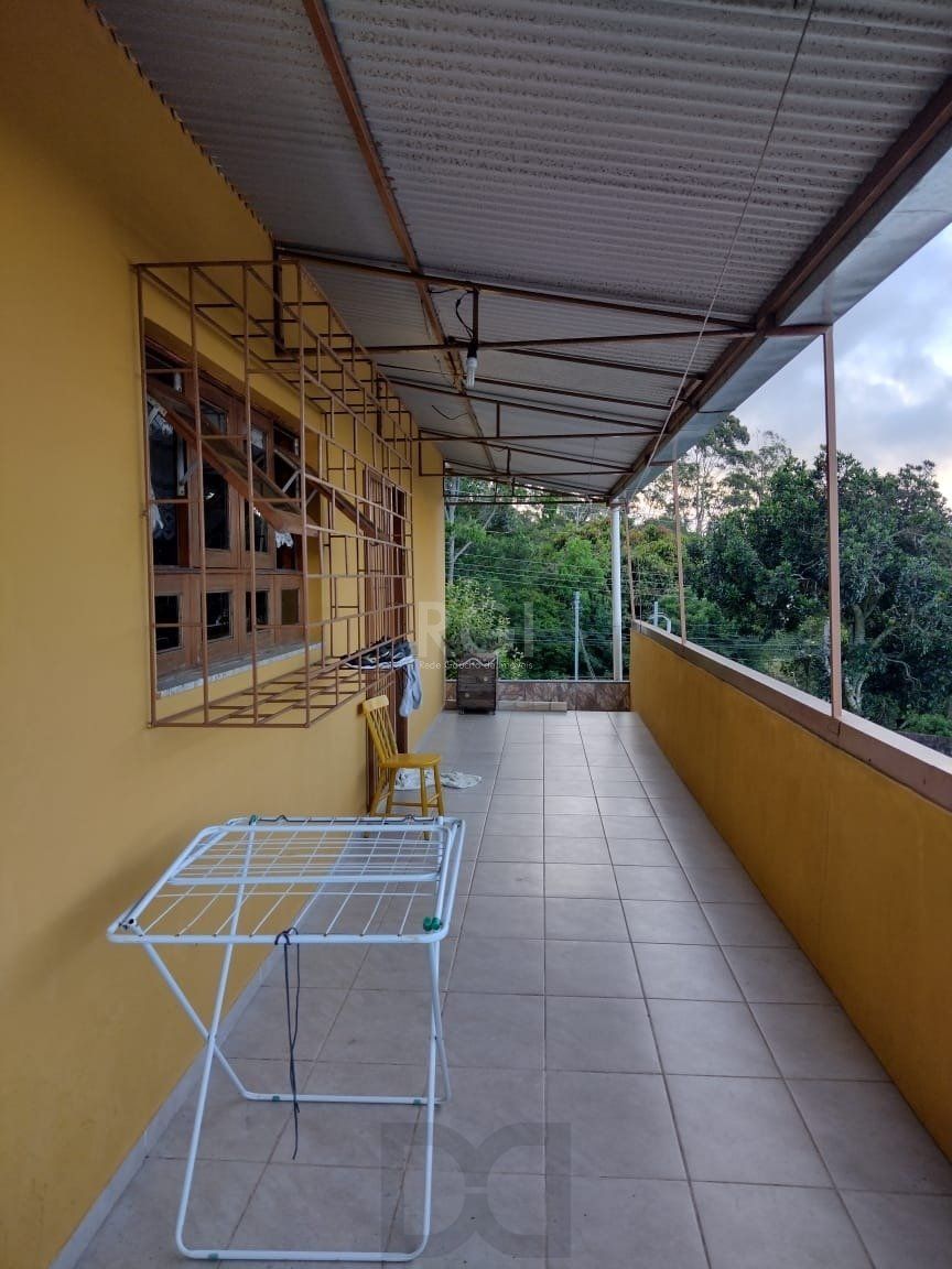 Casa para Venda - 0.18m², 2 dormitórios, sendo 2 suites, 3 vagas - Lomba do Pinheiro — foto 13