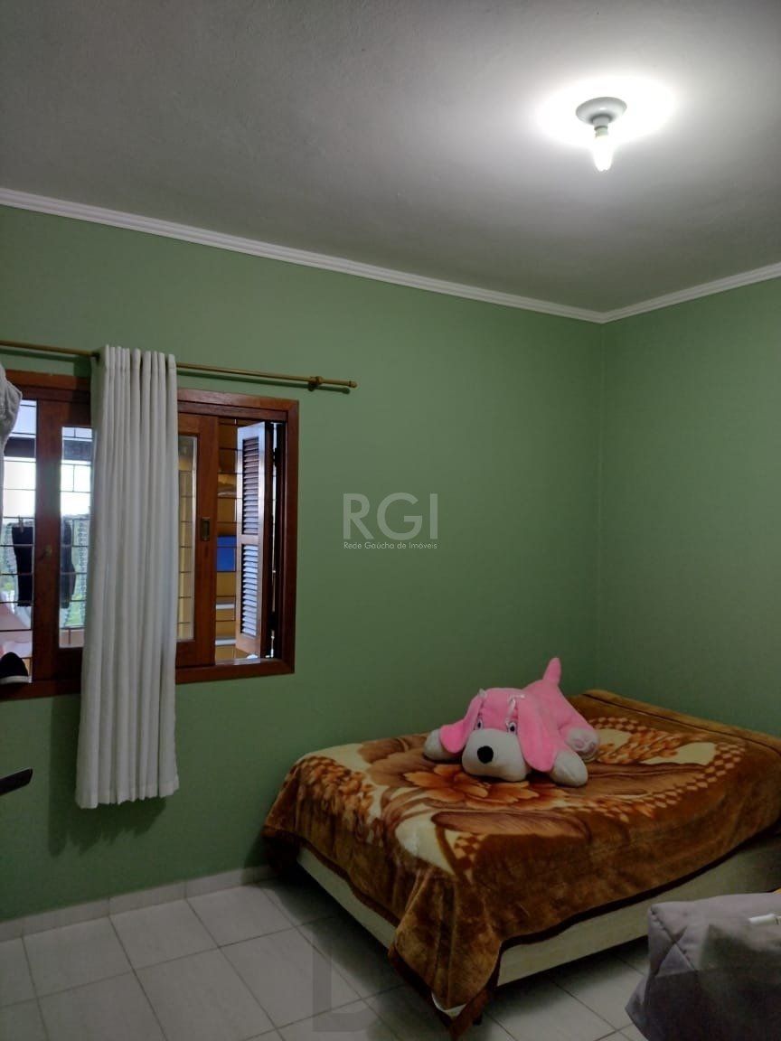Casa para Venda - 0.18m², 2 dormitórios, sendo 2 suites, 3 vagas - Lomba do Pinheiro — foto 6