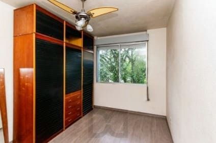 Apartamento 2 quartos, piso laminado, garagem coberta, próximo á UNIRRITER e 4 quadras Protásio Alves. — foto 11