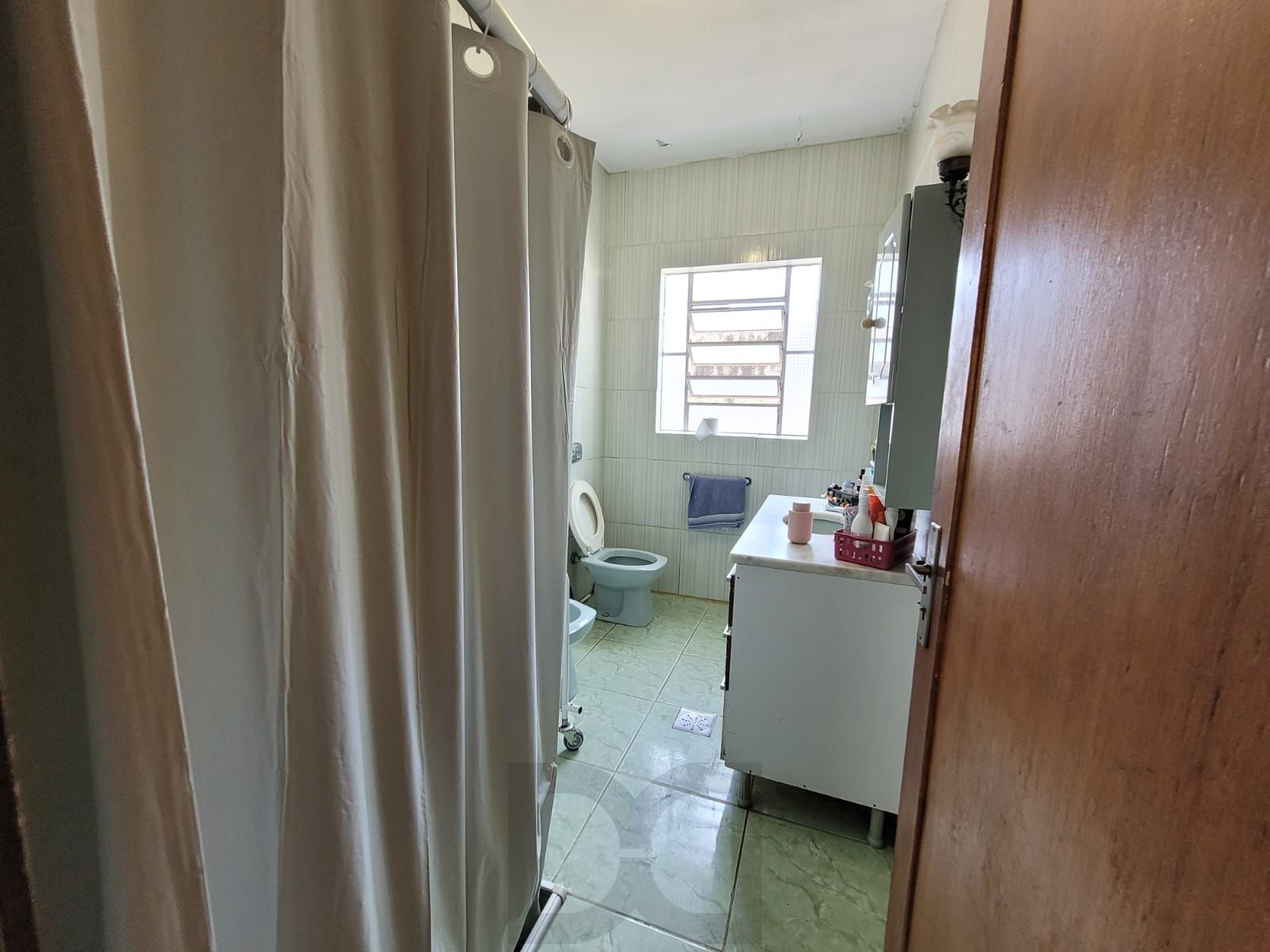 Casa térrea com garagem no subsolo e anexo — foto 13
