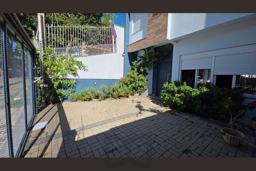 Belíssima casa de 4 dormitórios com 01 suíte com 2 vagas na Chácara das Pedras — foto 32