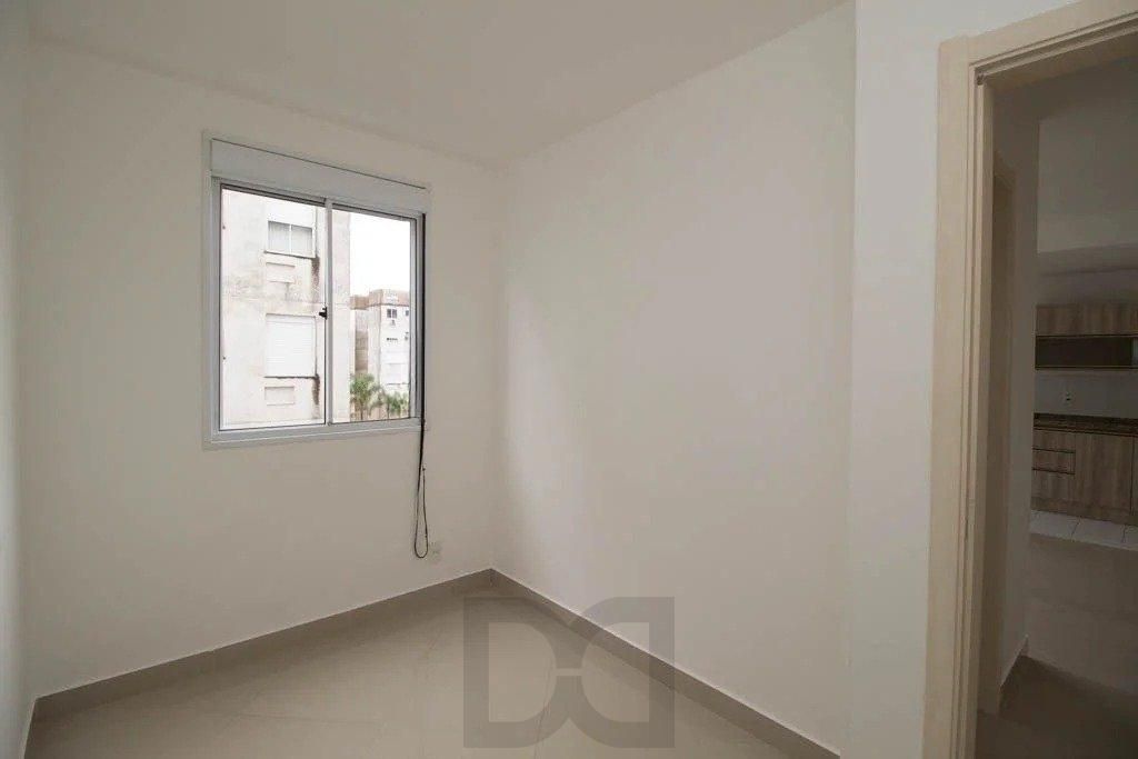 Apartamento 02 dormitórios com garagem escriturada no Bairro Ipanema — foto 15