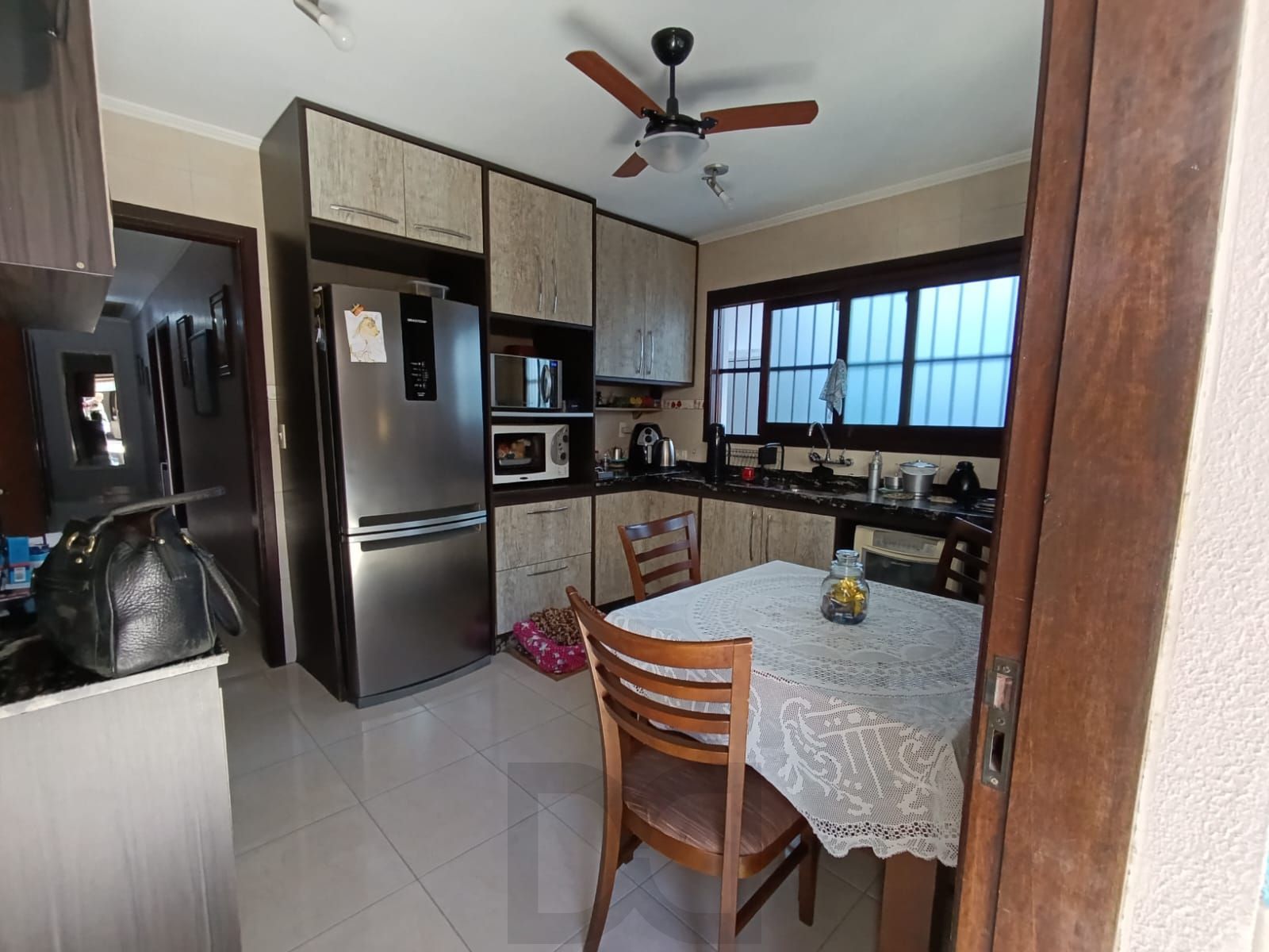 Casa de 3 quartos,suíte,churrasqueira, 3 vagas no bairro Sarandi — foto 9
