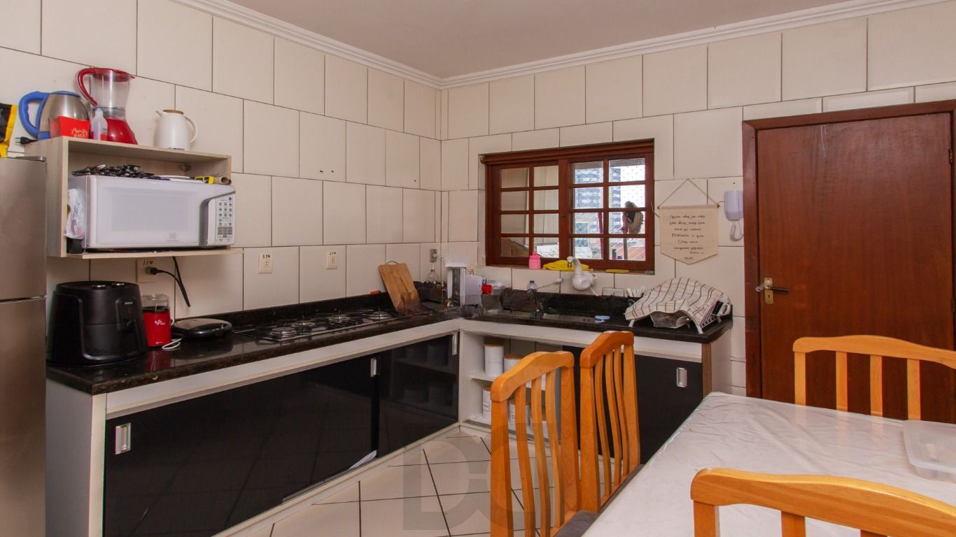 Apartamento à venda com 3 quartos e com sacada no bairro Partenon — foto 4