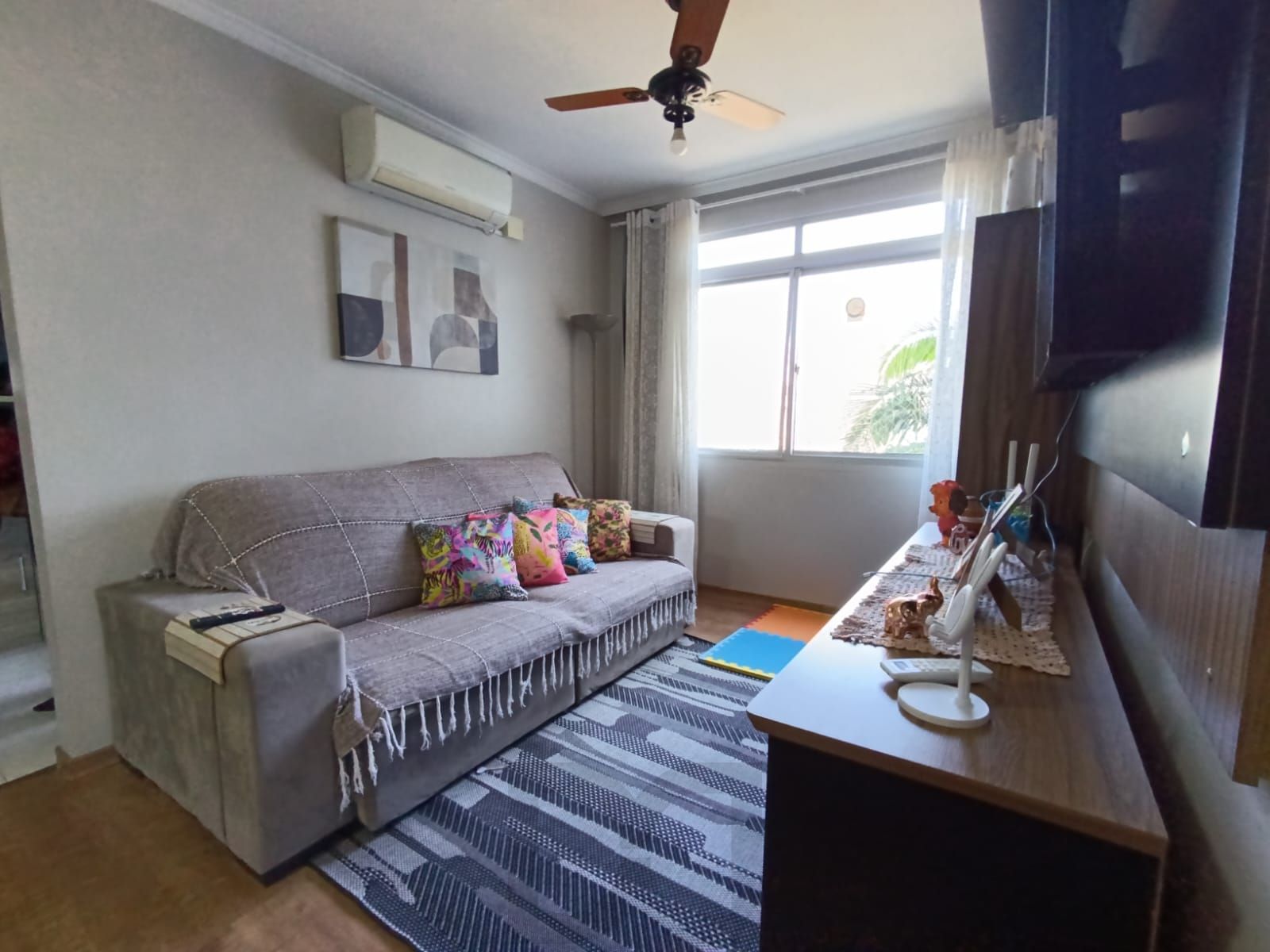 Apartamento semi mobiliado de 3 quartos e 1 vaga no bairro Sarandi. — foto 1