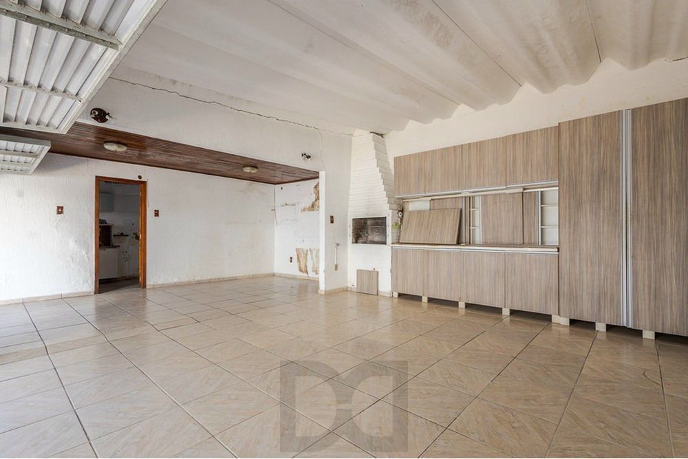 Casa com 4 quartos, 7 vagas e pátio no Bairro Higienópolis — foto 33