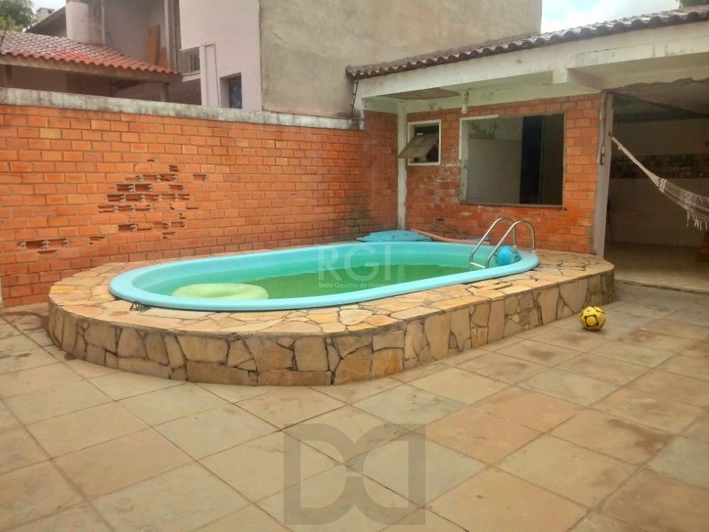Casa com piscina 3 dormitórios e 2 Costa e Silva Zona Norte de Porto Alegre — foto 3