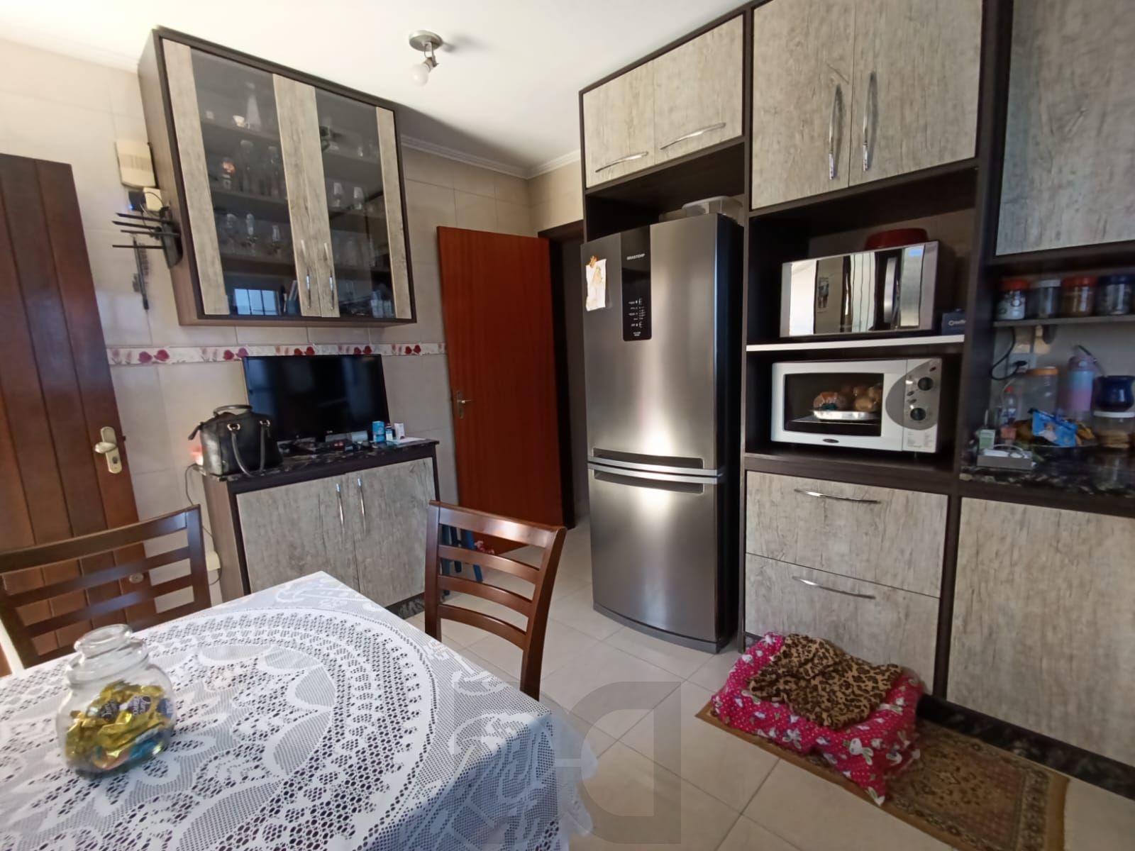 Casa de 3 quartos,suíte,churrasqueira, 3 vagas no bairro Sarandi — foto 8