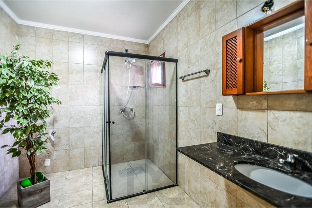 Casa em condomínio fechado de 2 quartos, suíte, 2 vagas no bairro Guarujá — foto 14