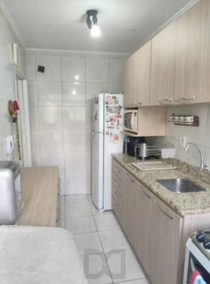 Apartamento de 2 dormitórios com 1 vaga de garagem no bairro Passo da Areia — foto 7