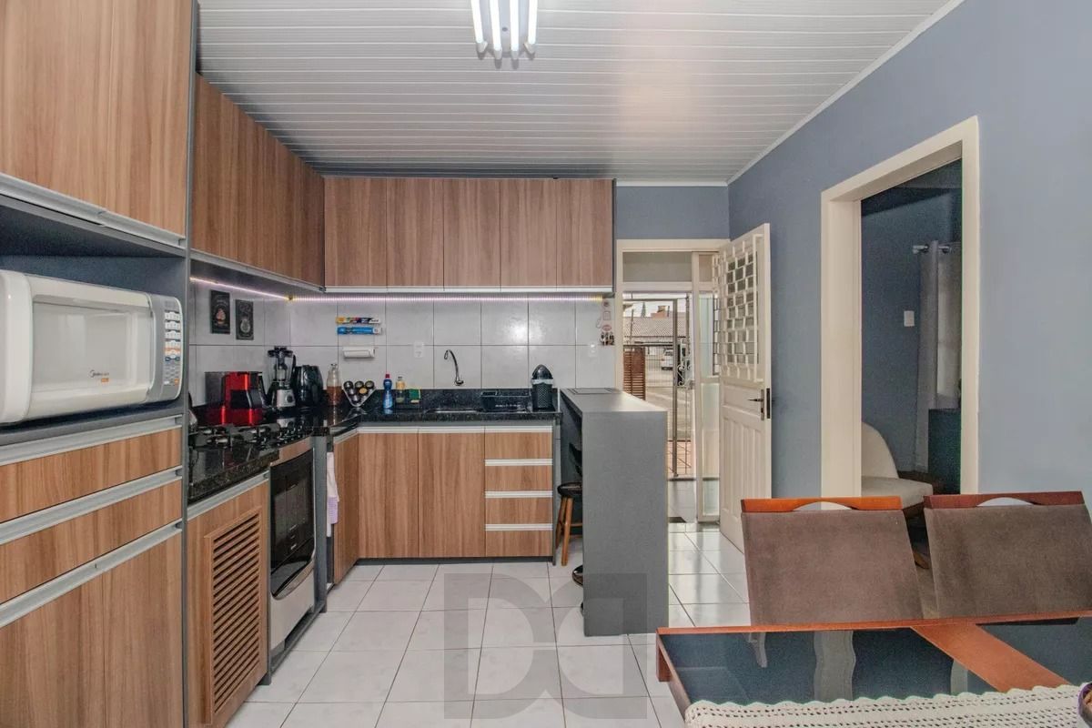 Casa com 1 quarto, churrasqueira e 4 vagas no bairro Sarandi — foto 5