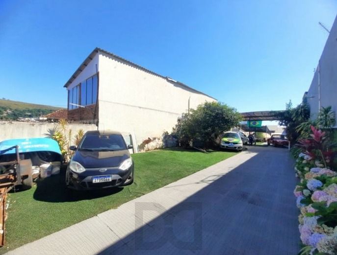 Casa de 4 quartos,suíte,churrasqueira no bairro Nonoai — foto 1