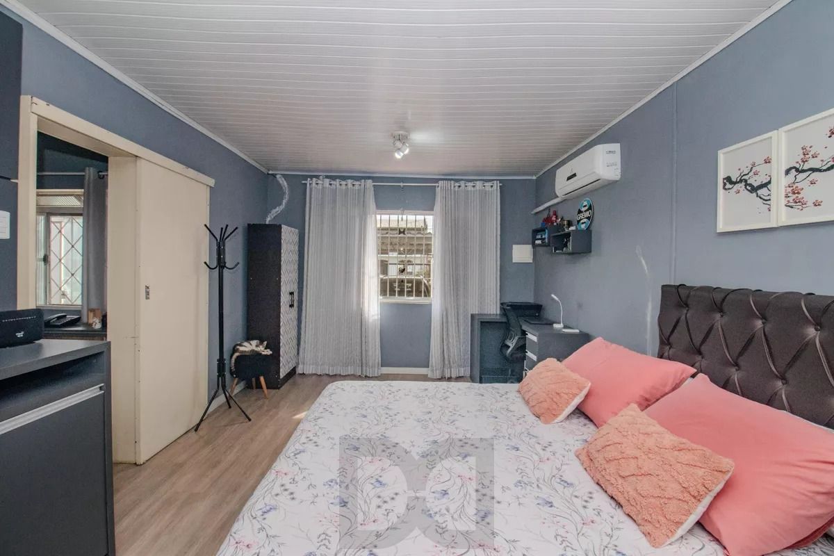 Casa com 1 quarto, churrasqueira e 4 vagas no bairro Sarandi — foto 9
