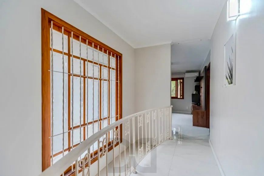 Casa com pátio 4 dormitórios 4 vagas Residencial ou Com. Partenon Porto Alegre — foto 11