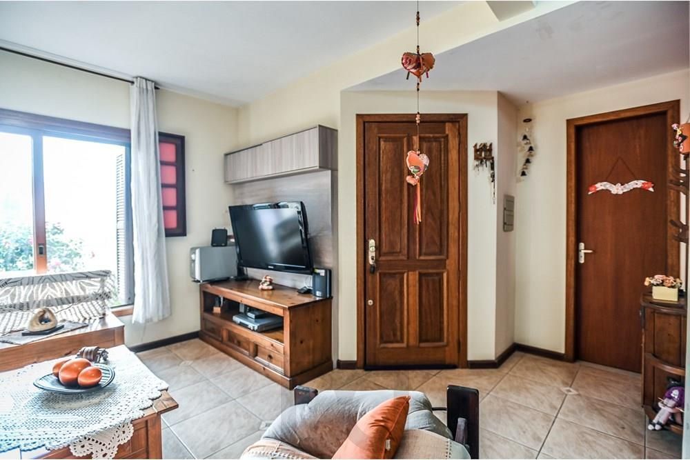 Casa em condomínio fechado de 2 quartos, suíte, 2 vagas no bairro Guarujá — foto 26