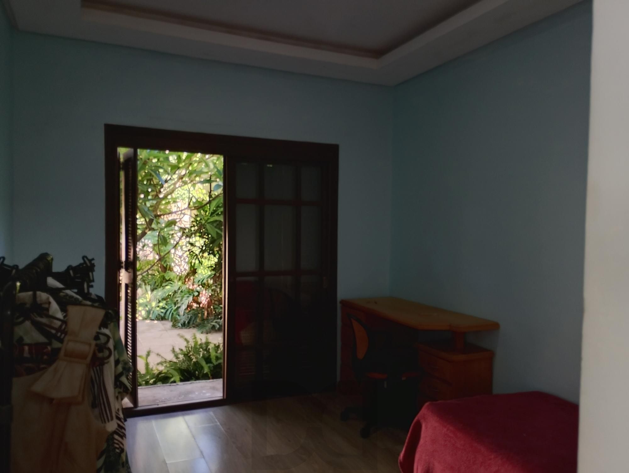 Casa com 3 quartos, 4 vagas de garagem e com pátio no bairro Parque Santa Fé — foto 22
