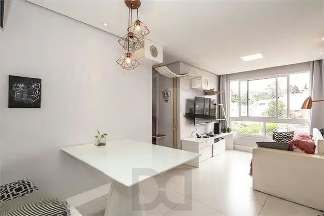 Apartamento 2 dormitórios, 1 suíte, 1 vaga e churrasqueira na Bento Gonçalves. — foto 1