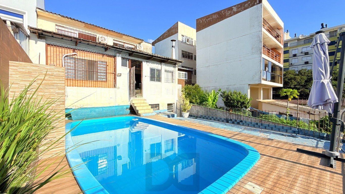 Casa com 4 quartos, vaga coberta, piscina e pátio no bairro Cristo Redentor — foto 28