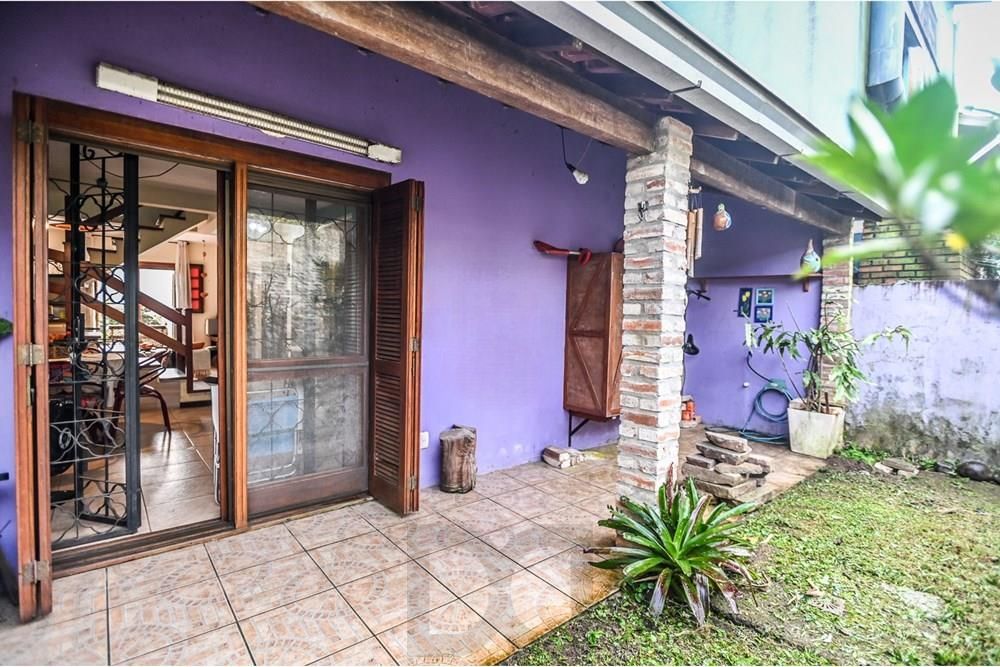 Casa em condomínio fechado de 2 quartos, suíte, 2 vagas no bairro Guarujá — foto 16