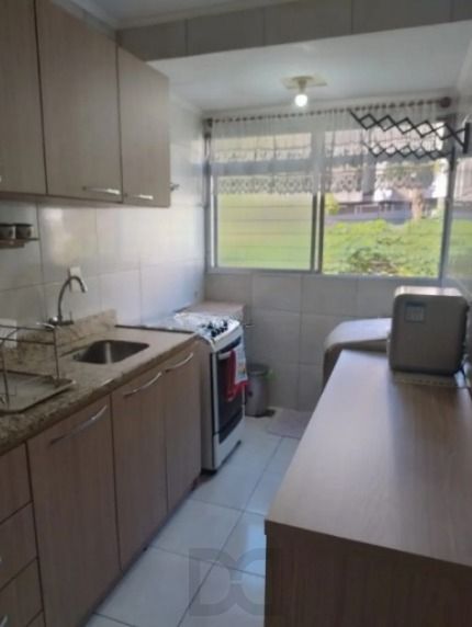 Apartamento de 2 dormitórios com 1 vaga de garagem no bairro Passo da Areia — foto 6