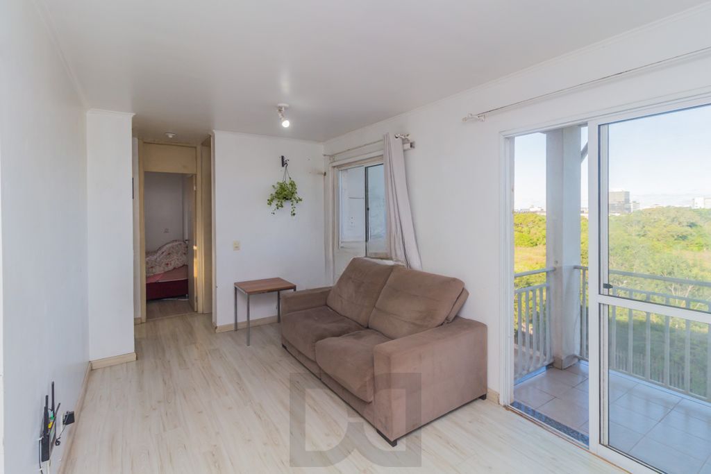 Apartamento com 2 dormitórios e 1 vaga de garagem no Bairro Humaitá — foto 1