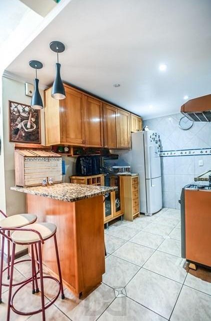 Casa em condomínio fechado de 2 quartos, suíte, 2 vagas no bairro Guarujá — foto 10