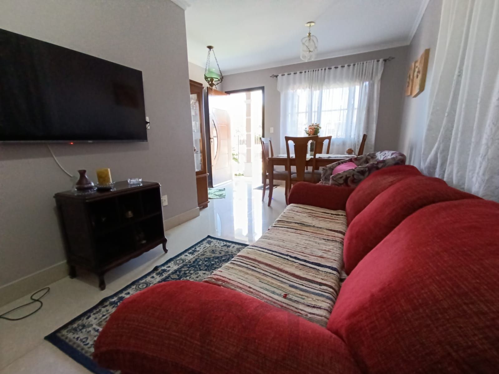 Casa de 3 quartos,suíte,churrasqueira, 3 vagas no bairro Sarandi — foto 3
