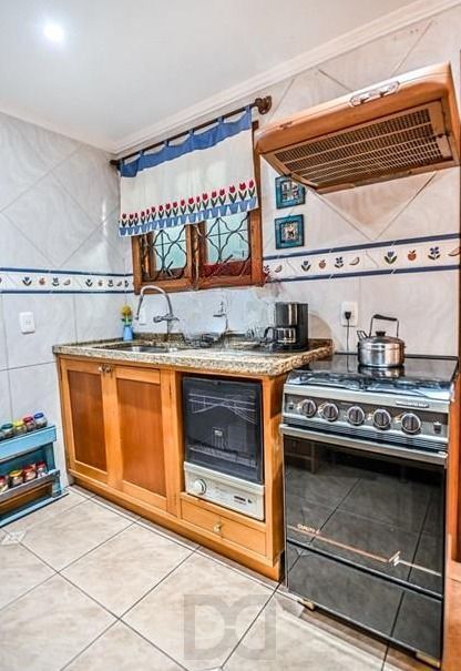 Casa em condomínio fechado de 2 quartos, suíte, 2 vagas no bairro Guarujá — foto 28