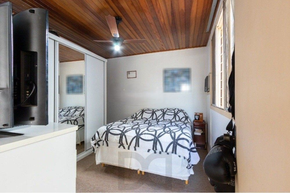 Excelente casa com 5 dormitórios, 2 suítes, 3 vagas de garagem e uma vista perene para o por do sol no Guaiba. — foto 36