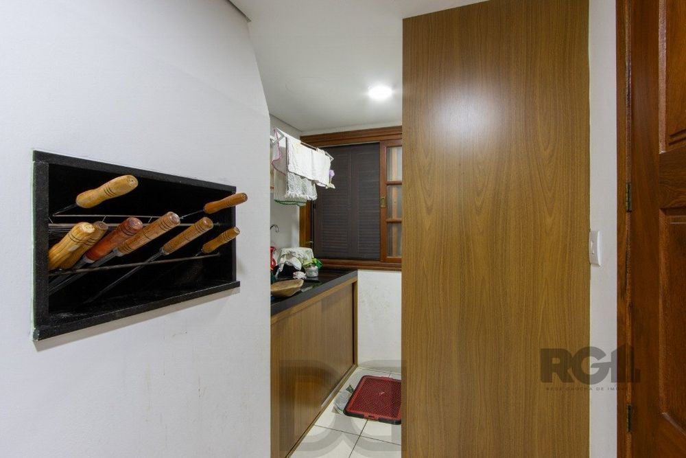Casa em condomínio com 3 dormitórios, vaga coberta, churrasqueira - Bairro Camaquã — foto 17