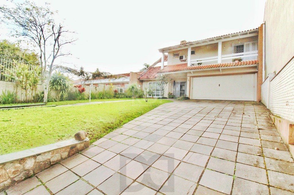 Casa em Porto Alegre, no bairro Jardim Isabel, com 4 dormitório(s), e 4 banheiro — foto 2